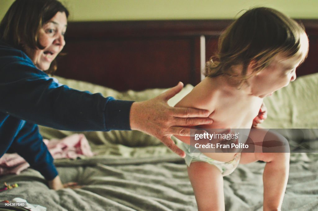 Grandmother and granddaughter.