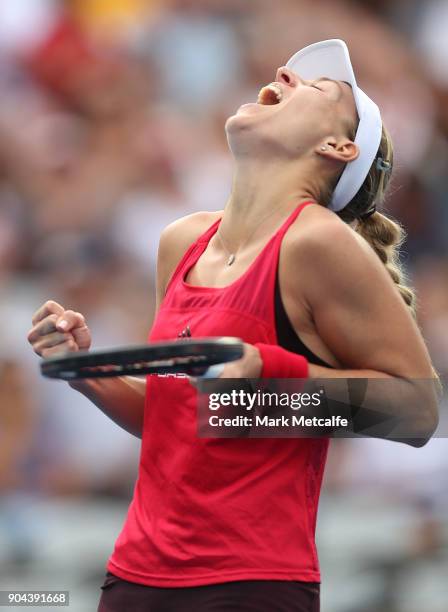 Angelique Kerber of Germany celebrates winning match point in her Women's Singles Final match against Ashleigh Barty of Australia during day seven of...