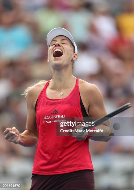 Angelique Kerber of Germany celebrates winning match point in her Women's Singles Final match against Ashleigh Barty of Australia during day seven of...