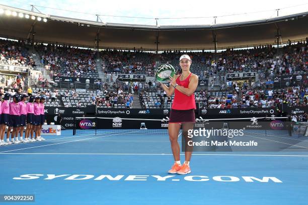 Angelique Kerber of Germany poses with the winners trophy after the Women's Singles Final match against Ashleigh Barty of Australia during day seven...