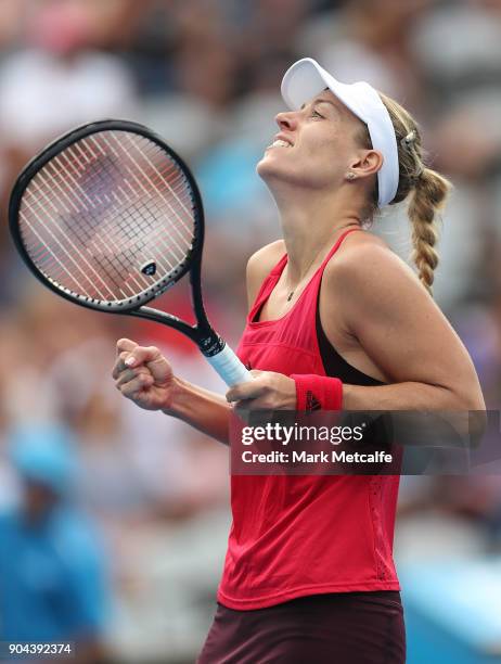 Angelique Kerber of Germany celebrates winning match point in her Women's Singles Final match against Ashleigh Barty of Australia during day seven of...