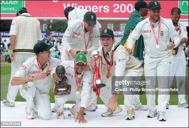 South Africa captain Graeme Smith and his team celebrate winning the four-match series against England at the end of the 4th Test match between...