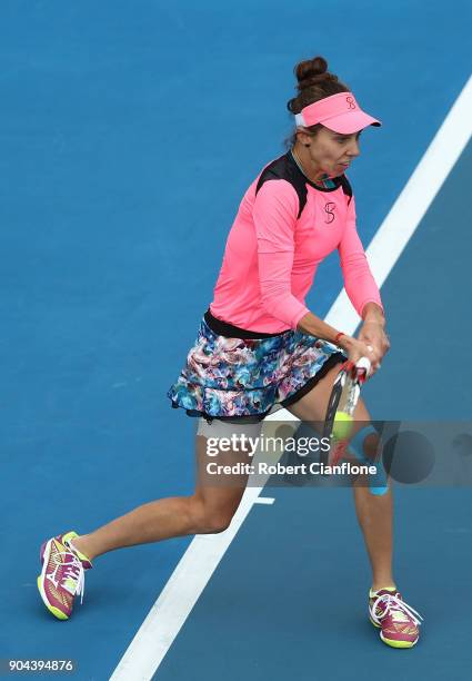 Mihaela Buzarnescu of Romania returns a shot during her finals match against Elise Mertens of Belgium during the 2018 Hobart International at Domain...