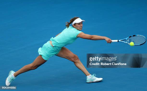 Elise Mertens of Belgium plays a backhand during her finals match against Mihaela Buzarnescu of Romania during the 2018 Hobart International at...
