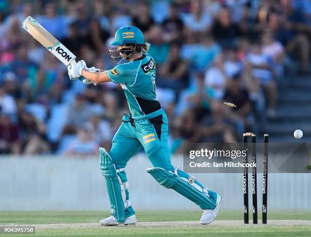 Beth Mooney of the Heat is bowled during the Women's Big Bash League match between the Brisbane Heat and the Melbourne Stars on January 13, 2018 in...