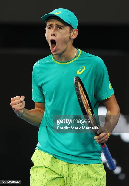 Alex de Minaur of Australia celebrates winning set point in his Men's Singles Final match against Daniil Medvedev of Russia during day seven of the...