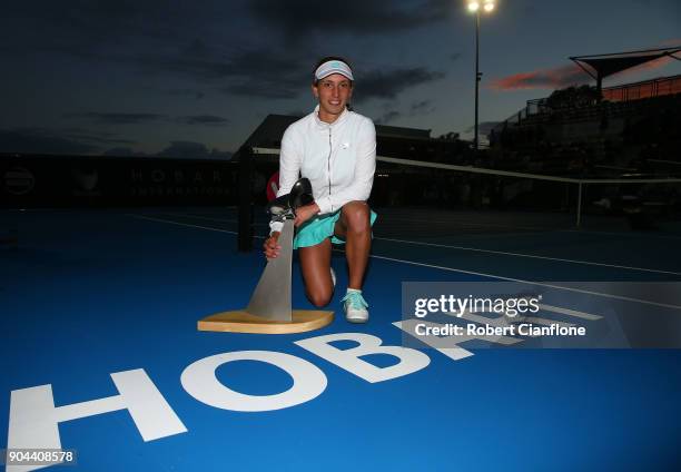 Elise Mertens of Belgium poses with the winner's trophy after she defeated Mihaela Buzarnescu of Romania during the 2018 Hobart International at...