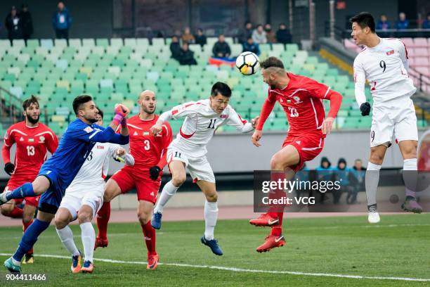 Saadou Abdelsalam of Palestine heads the ball during the AFC U-23 Championship Group B match between Palestine and North Korea at Jiangyin Stadium on...