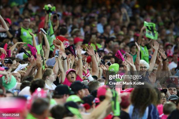 The crowd enjoy the atmosphere during the Big Bash League match between the Sydney Sixers and the Sydney Thunder at Sydney Cricket Ground on January...