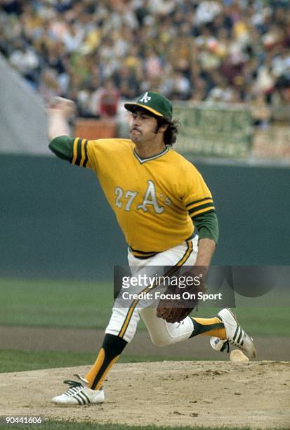 S: Pitcher Jim Catfish Hunter of the Oakland Athletics pitches during a circa early 1970's Major League baseball game at the Oakland Coliseum in...