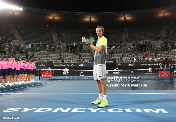 Daniil Medvedev of Russia poses with the winners trophy after his Men's Singles Final match against Alex de Minaur of Australia during day seven of...