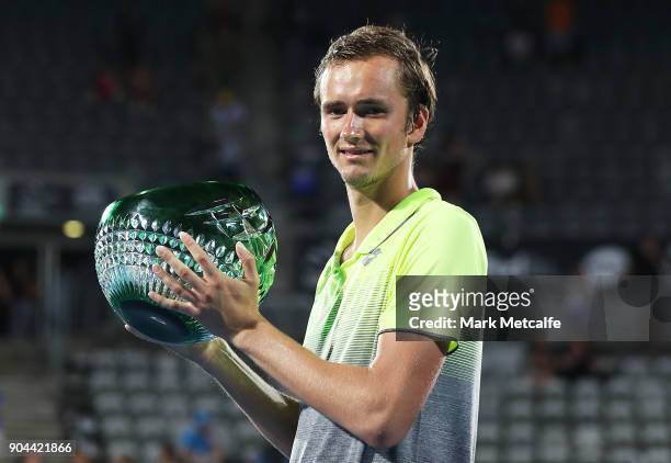 Daniil Medvedev of Russia poses with the winners trophy after his Men's Singles Final match against Alex de Minaur of Australia during day seven of...