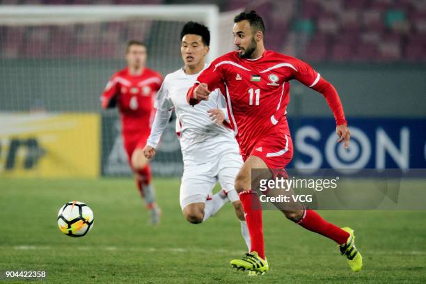 Mohamed Darwish of Palestine follows the ball during the AFC U-23 Championship Group B match between Palestine and North Korea at Jiangyin Stadium on...