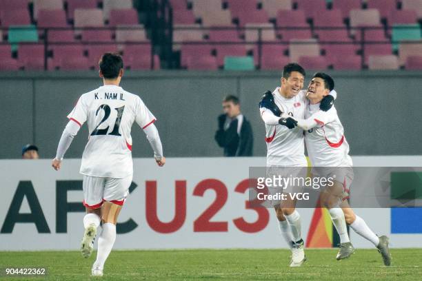Players of North Korea celebrate a point during the AFC U-23 Championship Group B match between Palestine and North Korea at Jiangyin Stadium on...