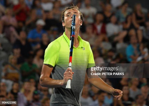 Daniil Medvedev of Russia kisses his racquet after beating Alex De Minaur of Australia in the men's singles final at the Sydney International tennis...