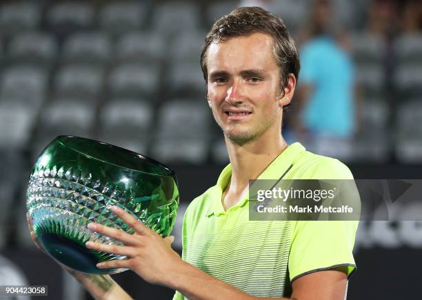 Daniil Medvedev of Russia poses with the winners trophy after his Men's Singles Final match against Alex de Minaur of Australia during day seven of...