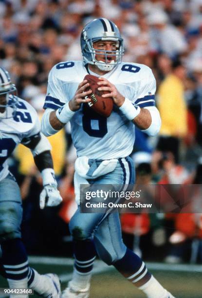 Troy Aikman of the Dalas Cowboys looks to pass against the Buffalo Bills in Super Bowl 27 played at the Rose Bowl circa 1993 in Pasadena,California...