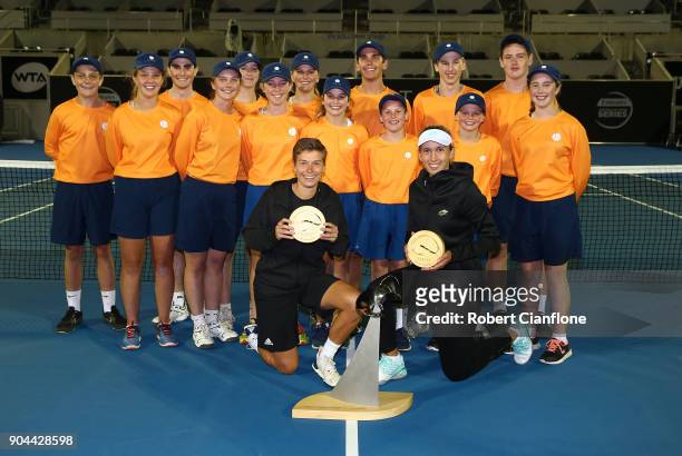 Elise Mertens of Belgium and Demi Schuurs of the Netherlands pose after winning the doubles final againsts Lyudmyla Kichenok of the Ukraine and...