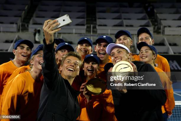 Elise Mertens of Belgium and Demi Schuurs of the Netherlands take a selfie after winning the doubles final againsts Lyudmyla Kichenok of the Ukraine...