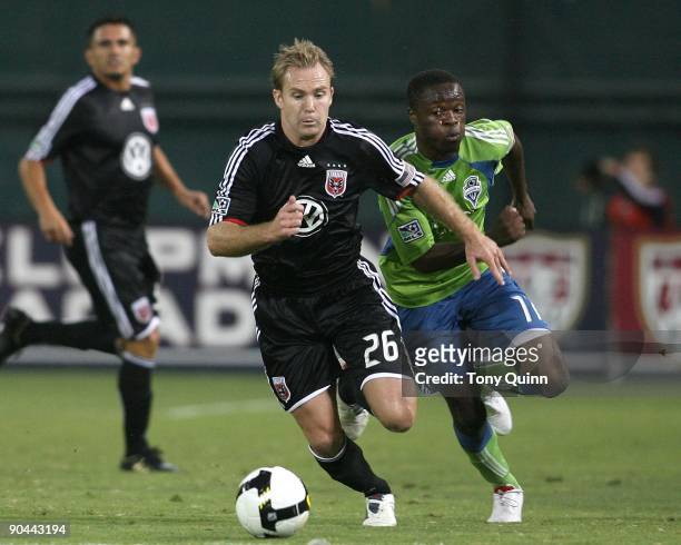 Steve Zakuani of the Seattle Sounders chases after Bryan Namoff of D.C. United during the final of the US Open Cup won by Seattle 2-1 at RFK Stadium...