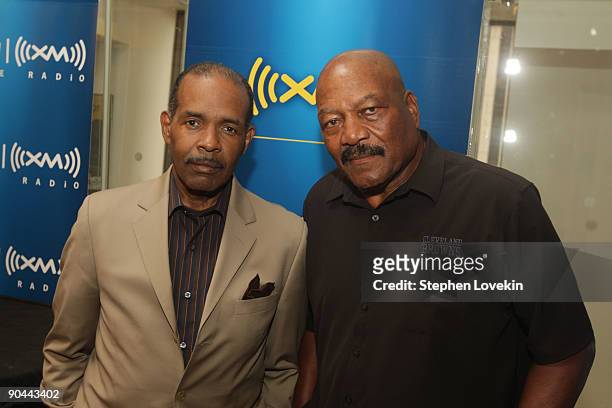 Host Joe Madison and football legend Jim Brown at the SIRIUS XM Studios on September 8, 2009 in New York City.