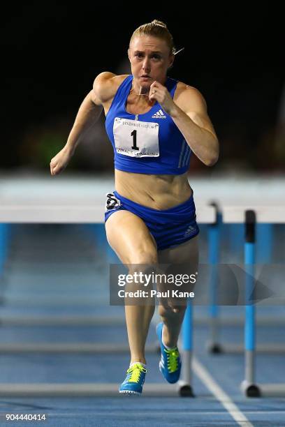 Sally Pearson competes in the women's 100 metre hurdles during the Jandakot Airport Perth Track Classic at WA Athletics Stadium on January 13, 2018...