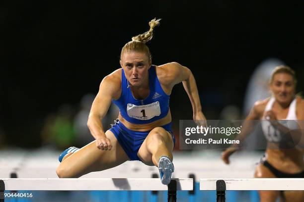 Sally Pearson competes in the women's 100 metre hurdles during the Jandakot Airport Perth Track Classic at WA Athletics Stadium on January 13, 2018...