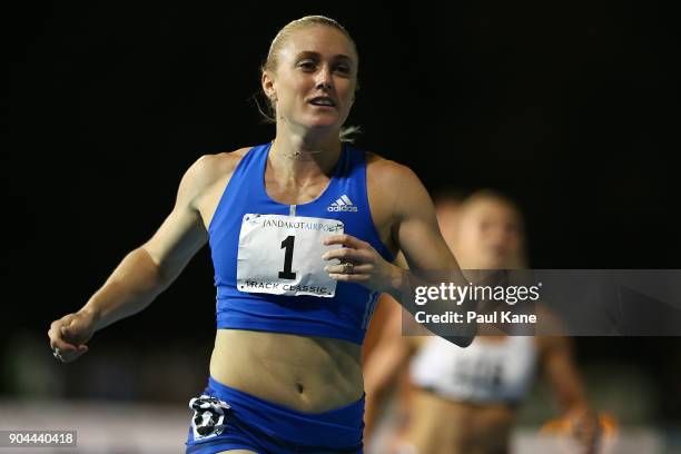 Sally Pearson competes in the women's 100 metre hurdles during the Jandakot Airport Perth Track Classic at WA Athletics Stadium on January 13, 2018...