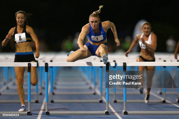 Sally Pearson competes in the women's 100 metre hurdles during the Jandakot Airport Perth Track Classic at WA Athletics Stadium on January 13, 2018...