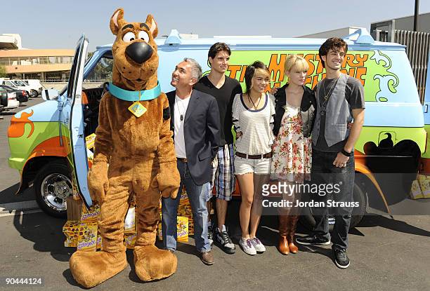 Actors Nick Palatas, Kate Melton, Robbie Amell and Hayley Kiyoko from "Scooby Doo! The Mystery Begins" celebrate Scooby-Doo and Cesar Millan's 40th...
