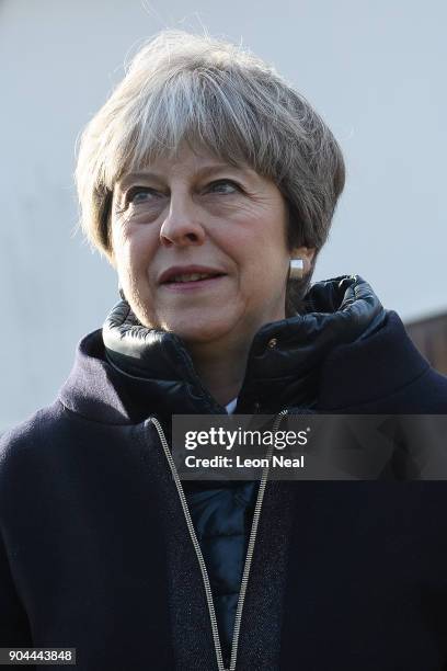 British Prime Minister Theresa May joins MP for Sutton and Cheam Paul Scully as he campaigns for the vote in the London local elections in May, on...