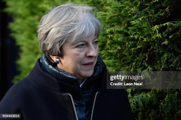 British Prime Minister Theresa May joins MP for Sutton and Cheam Paul Scully as he campaigns for the vote in the London local elections in May, on...