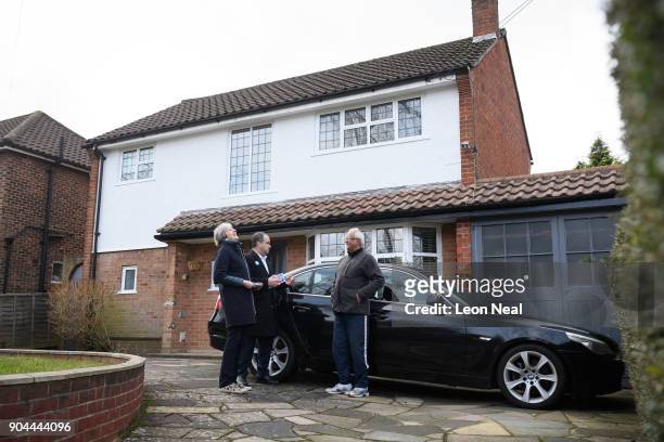 British Prime Minister Theresa May joins MP for Sutton and Cheam Paul Scully as he campaigns for the vote in the London local elections in May, on...