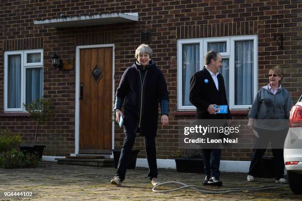 British Prime Minister Theresa May joins MP for Sutton and Cheam Paul Scully as he campaigns for the vote in the London local elections in May, on...