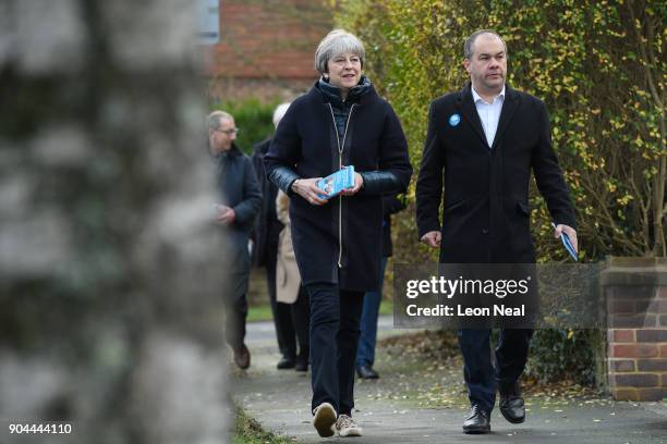 British Prime Minister Theresa May joins MP for Sutton and Cheam Paul Scully as he campaigns for the vote in the London local elections in May, on...