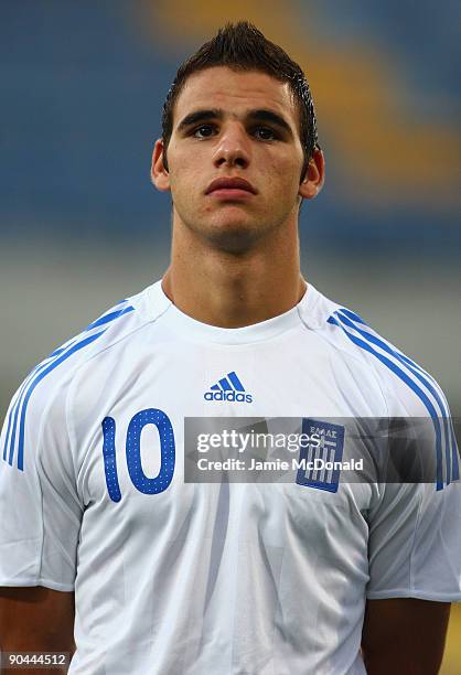 Panagiotis Tachtsidis of Greece looks on during the UEFA U21 Championship match between Greece and England at the Asteras Tripolis Stadium on...