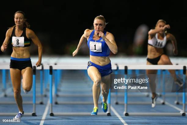 Sally Pearson competes in the women's 100 metre hurdles during the Jandakot Airport Perth Track Classic at WA Athletics Stadium on January 13, 2018...