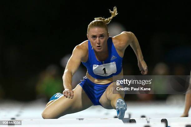 Sally Pearson competes in the women's 100 metre hurdles during the Jandakot Airport Perth Track Classic at WA Athletics Stadium on January 13, 2018...