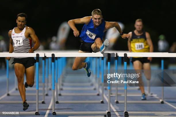 Cedric Dubler competes in the men's 100 metre hurdles during the Jandakot Airport Perth Track Classic at WA Athletics Stadium on January 13, 2018 in...