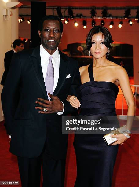 Actor Wesley Snipes and wife Nikki Park attend the "Brooklyn's Finest" premiere at the Sala Grande during the 66th Venice Film Festival on September...