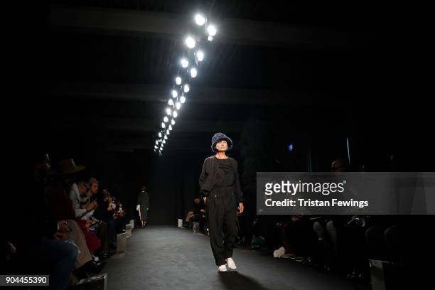 Model walks the runway at the Miaoran show during Milan Men's Fashion Week Fall/Winter 2018/19 on January 13, 2018 in Milan, Italy.