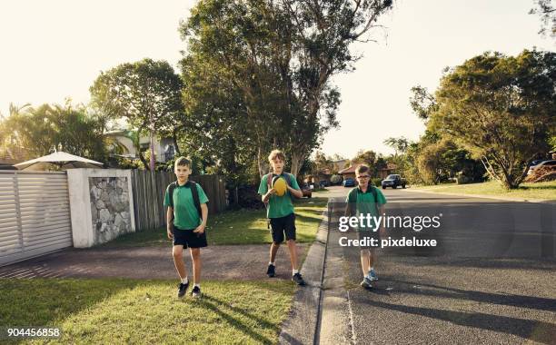 another day of school done - suburb stock pictures, royalty-free photos & images