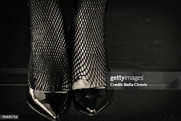 pair of black net shoes - laufmasche stock-fotos und bilder