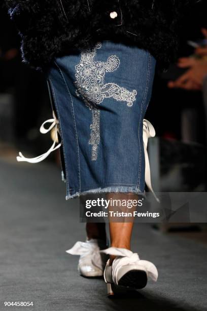 Model, fashion detail, walks the runway at the Miaoran show during Milan Men's Fashion Week Fall/Winter 2018/19 on January 13, 2018 in Milan, Italy.