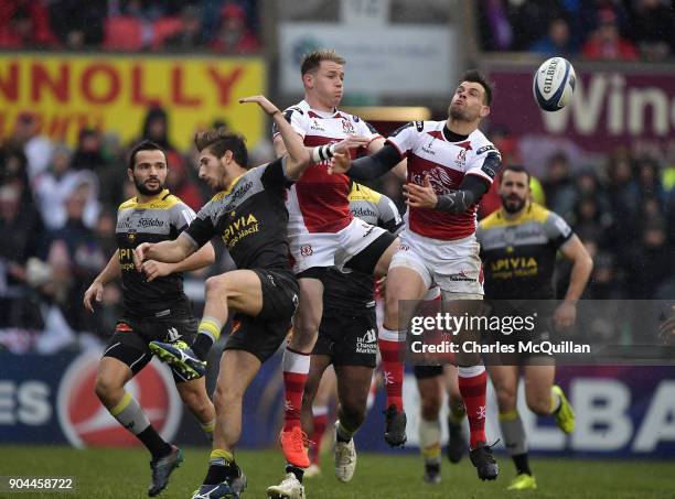 Louis Ludik and Craig Gilroy of Ulster and Vincent Rattez of La Rochelle during the European Rugby Champions Cup match between Ulster Rugby and La...