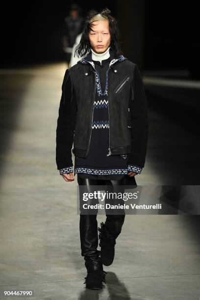 Model walks the runway at the Diesel Black Gold show during Milan Men's Fashion Week Fall/Winter 2018/19 on January 13, 2018 in Milan, Italy.