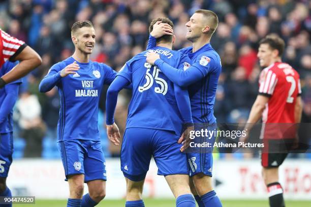 Anthony Pilkington of Cardiff City celebrates scoring his sides fourth goal of the match with Yanic Wildschut during the Sky Bet Championship match...