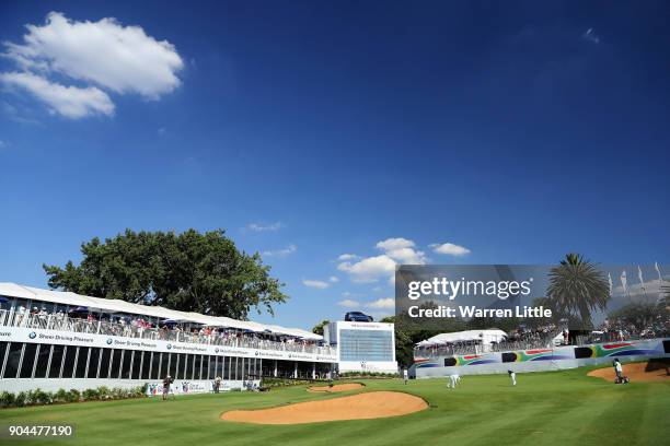 Branden Grace of South Africa putts on the 18th green dduring the third round of the BMW South African Open Championship at Glendower Golf Club on...
