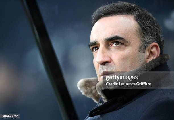 Carlos Carvalhal, Manager of Swansea City looks on prior to the Premier League match between Newcastle United and Swansea City at St. James Park on...