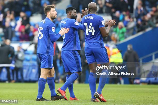 Yanic Wildschut of Cardiff City and Sol Bamba applaud the fans after the final whistle of the Sky Bet Championship match between Cardiff City and...